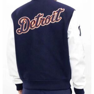 Material: 100% Real Wool Color: Navy Blue & White Inner: Soft Viscose Lining Closure: Snap Tab Sleeves: Real Leather Sleeves Collar: Rib Knitted Cuffs: Rib Knitted Shipping: Free International Shipping Availability: In Stock